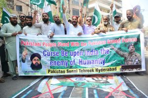Pakistan Sunni Tehreek workers holding rally in favor of Pakistan Army, following Indian airstrikes at outside Press club