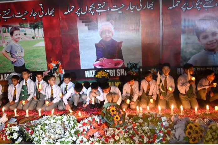 The students of Pakistan Sweet Homes participating in a candle light vigil at D-Chowk to pay tribute to the martyred children during the unprovoked Indian attack on civilians in Pakistan