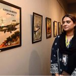 Students are vesting the photo exhibition after inaugurating on the occasion of Thanks giving Day (youm-E-tshakur) organized by the Fine Arts Department University of Sargodha