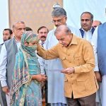 Prime Minister Muhammad Shehbaz Sharif distributing relief cheques amongst the families of martyred during Ma’arka-e-Haq