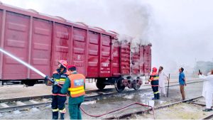 Rescue 1122 workers trying to extinguish fire that broke out on a freight train at Sama Satta Railway Station