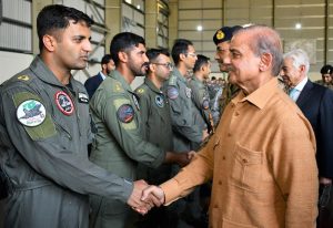 Prime Minister Muhammad Shehbaz Sharif interacts with officers at the Kamra Aeronautical Complex
