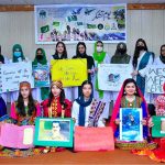 SBBWU students carrying play cards in connection with celebration of Youm-e-Tashakur at SBBWU