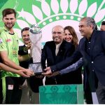 President of Pakistan, Asif Ali Zardari, presents the trophy to Lahore Qalandars' captain Shaheen Shah Afridi after their victory against Quetta Gladiators in the PSL-X T20 Final at Gaddafi Stadium.