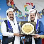 Chairman Prime Minister Youth Program Rana Mashhood Ahmed Khan being presented with a commemorative shield by Ghazi University Vice Chancellor Dr. Ashfaq Ahmed