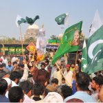 Protesters burn an effigy of Indian Prime Minister Narendra Modi during a protest after India launched missile strikes in Pakistan