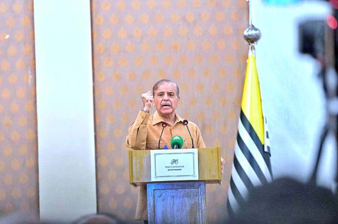 Prime Minister Muhammad Shehbaz Sharif addressing the cheque distributing ceremony amongst the families of martyred during Ma'arka-e-Haq