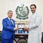 Federal Minister for Defence Production, Muhammad Raza Hayat Harraj presenting a souvenir to Mr. Khazar Farhadov, Ambassador of Azerbaijan in Rawalpindi