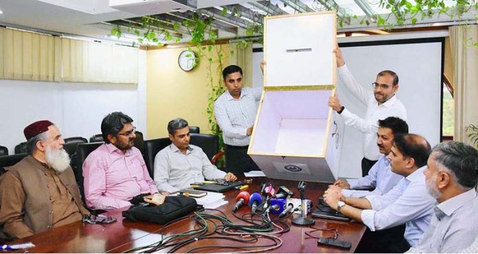 Officials from the Power Division, GENCOS, and NESPAK open bids for GENCOs' plant disposal (Phase-II), ensuring transparency in the presence of media