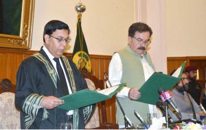 Chief Justice Balochistan High Court, Muhammad Ejaz Swati along with Governor Jaffar Khan Mandokhail and Chief Minister, Mir Sarfraz Bugti stands in honor of National Anthem during the oath taking ceremony of Chief justice of Balochistan High Court