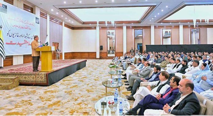 Prime Minister Muhammad Shehbaz Sharif addressing the cheque distributing ceremony amongst the families of martyred during Ma'arka-e-Haq
