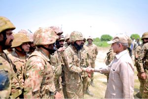 Prime Minister Muhammad Shehbaz Sharif interacts with officers and soldiers who participated in Operation Bunyan-um- Marsous