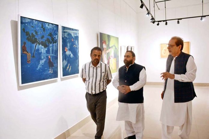 Federal Minister for National Heritage and Culture Division Aurangzeb Khan Khichi visiting a gallery at Arts Council of Pakistan