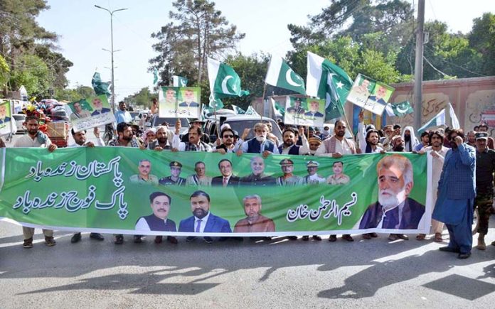 Advisor to the Chief Minister for Environment Naseem Ur Rehman leads a rally organized in the city