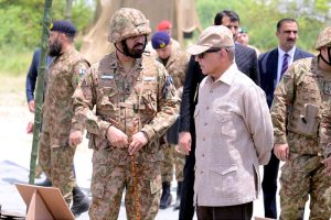 Prime Minister Muhammad Shehbaz Sharif interacts with officers and soldiers who participated in Operation Bunyan-um- Marsous