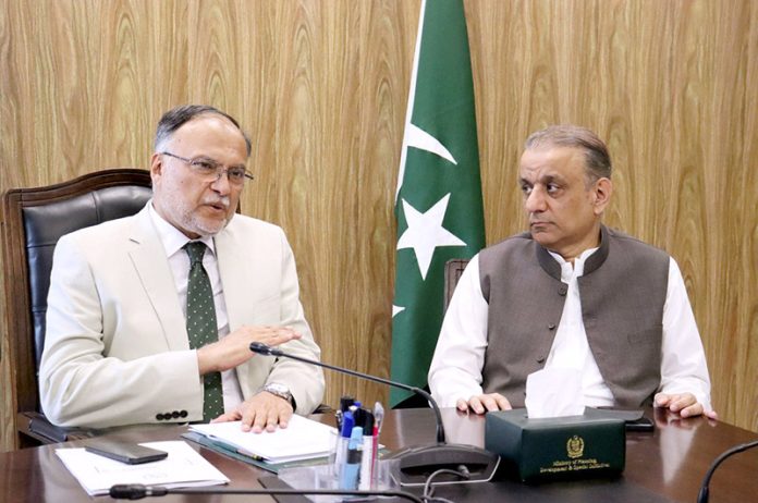 Planning Minister Ahsan Iqbal and Minister for Communications Abdul Aleem Khan chairs a joint meeting on priority projects of National Highways Authority