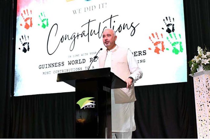 Ambassador Faisal Niaz Tirmizi, Pakistan’s Envoy to the UAE speaks during a landmark event at the Pakistan Association where the official announcement was made of a new Guinness World Record of the largest UAE flag created using human handprints by Pakistani Association Dubai