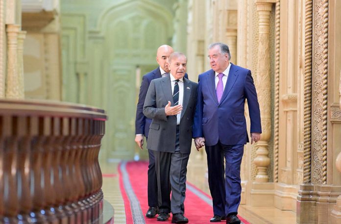 President of Tajikistan, Emomali Rahmon welcomes Prime Minister Muhammad Shehbaz Sharif upon arrival at the Palace of Nations