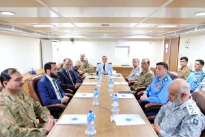 Prime Minister Muhammad Shehbaz Sharif being briefed by Commander Pakistan Fleet about Pakistan Navy's strategic orientation, operational preparedness and contributions during the ongoing operation, on board PNS TAIMUR at Naval Dockyard
