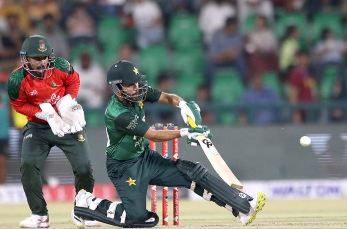 Pakistani batter Muhammad Haris playing a shot during the second T20 International cricket match of the three match series between Pakistan and Bangladesh at the Gaddafi Cricket Stadium
