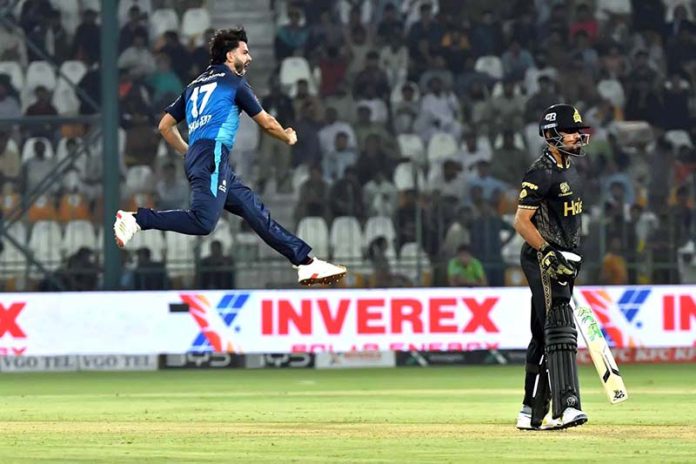 Multan Sultans bowler Shahid Aziz celebrates after taking wicket of Peshawar Zalmi batter Babar Azam during the PSL-X T20 cricket match between Multan Sultans and Peshawar Zalmi teams at the Multan Cricket Stadium