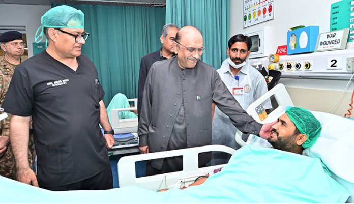 President Asif Ali Zardari inquiring after the health of the civilians and military personnel who were injured during the unprovoked Indian attacks on Pakistan, at Combined Military Hospital