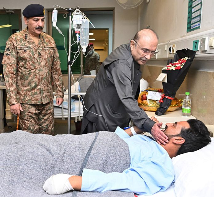 President Asif Ali Zardari inquiring after the health of the civilians and military personnel who were injured during the unprovoked Indian attacks on Pakistan, at Combined Military Hospital