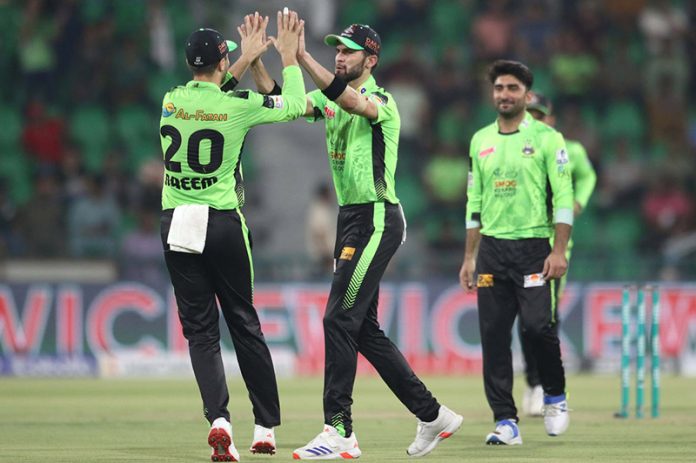 Lahore Qalanders players celebrate the wicket of Karachi Kings James Vince during the Pakistan Super League PSL-X T20 cricket match against Karachi Kings at the Gaddafi Cricket Stadium