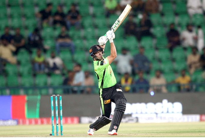 Lahore Qalanders batter Muhammad Naeem plays a shot during the Pakistan Super League PSL-X T20 cricket match against Islamabad United at the Gaddafi Cricket Stadium