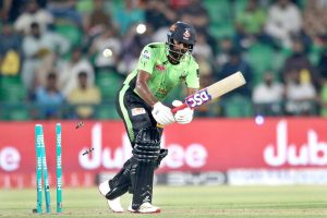 Lahore Qalanders batter Bhanuka Rajapaksa bowled out by Salman Irshad during the Pakistan Super League PSL-X T20 cricket match between Lahore Qalanders and Islamabad United at the Gaddafi Cricket Stadium