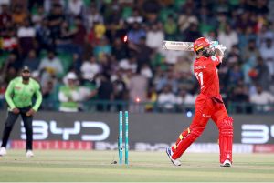 Lahore Qalanders batter Bhanuka Rajapaksa bowled out by Salman Irshad during the Pakistan Super League PSL-X T20 cricket match between Lahore Qalanders and Islamabad United at the Gaddafi Cricket Stadium