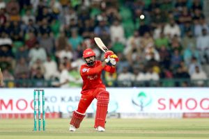 Lahore Qalanders players celebrate the wicket of Islamabad Uniteds’ Muhammad Shahzad bowled by Shaheen Shah Afridi during the Pakistan Super League PSL-X T20 cricket match between Lahore Qalanders and Islamabad United at the Gaddafi Cricket Stadium