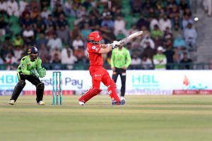 Lahore Qalanders players celebrate the wicket of Islamabad Uniteds’ Muhammad Shahzad bowled by Shaheen Shah Afridi during the Pakistan Super League PSL-X T20 cricket match between Lahore Qalanders and Islamabad United at the Gaddafi Cricket Stadium