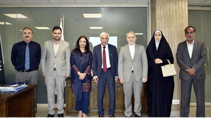 Federal Minister for Board of Investment, Mr. Qaiser Ahmed Sheikh in a group photo during a productive meeting with Iranian Ambassador Mr. Reza Amiri Moghadam to Discuss Bilateral Trade, Regional Stability, and Economic Cooperation