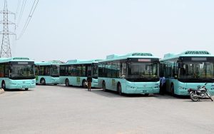 A view o CDA electric buses parked at Khanna Pul stop, waiting for passengers.