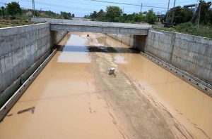 Stagnant rainwater and mud accumulated at the 10th Avenue underpass in the Federal Capital following last night's rainfall.