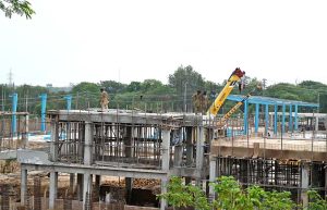 Laborers busy construction work of a bus charging station in H-8, part of a broader initiative to expand the electric bus network in the Federal Capital.