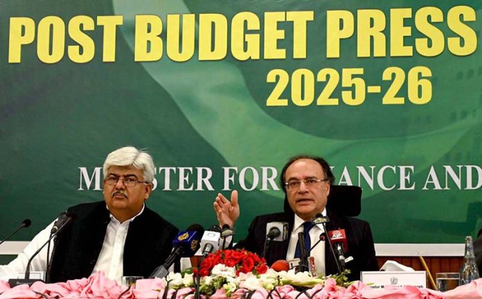 Minister for Finance and Revenue Muhammad Aurangzeb addressing to post budget press briefing 2025-26