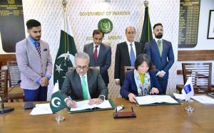 Dr. Kazim Niaz, Secretary Ministry of Economic Affairs and Emma Fan, Country Director of Asian Development Bank (ADB) signing 'Improved Resource Mobilization and Utilization Reform Program' between Pakistan and ADB