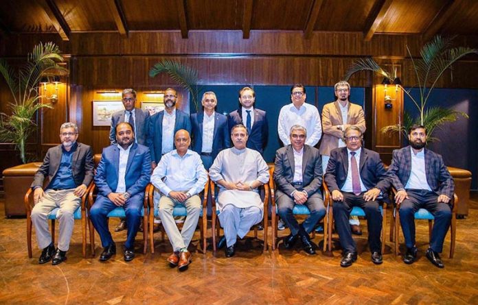 Federal Minister for Maritime Affairs, Muhammad Junaid Anwar Chaudhry posing for group photo with senior management from shipping lines and terminal operators headed by Aasim A. Siddiqui, Managing Director of Pakistan Intermodal Limited
