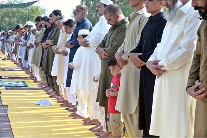 A large number of faithful offering Eidul Azha prayers at Eidgah Sharif