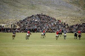 Chitral and Gilgit polo teams in action during Three-day Shandur Polo Festival 2025 at Shandur Polo ground.