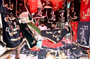 People purchasing Ashura related stuffs to be used during the mourning procession in Muharram ul Harram.