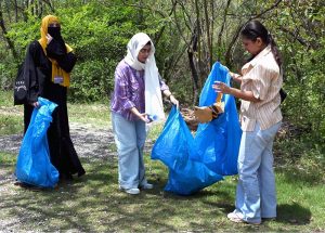 Students busy in picking garbage during launching ceremony of the Clean-up Drive Initiative at the Margallah Hills, National Park and Trail 5