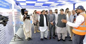 Federal Minister for Maritime Affairs, Muhammad Junaid Anwar Chaudhry is being briefed about an Oil Spill Response Exercise at Karachi Port Trust.