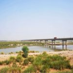 A view of the dry bed of the Chenab River near Head Muhammad Wala, reflecting the impact of water shortage in the region