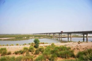 A view of the dry bed of the Chenab River near Head Muhammad Wala, reflecting the impact of water shortage in the region
