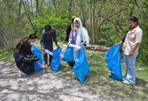 Students busy in picking garbage during launching ceremony of the Clean-up Drive Initiative at the Margallah Hills, National Park and Trail 5
