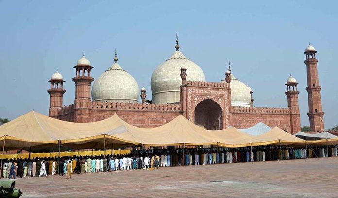 A large number of faithful offering Eidul Azha prayers at Historic Badshahi Masjid
