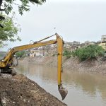 Municipal Corporation workers are busy cleaning Nullah Lai ahead of monsoon season to prevent potential flooding in the area.